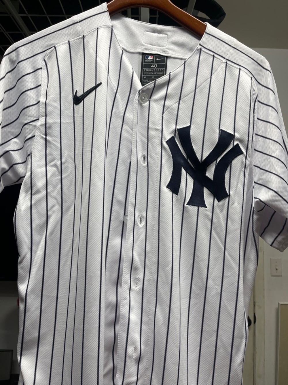 Nike White Baseball Jersey with Navy Pinstripes and Navy NY Logo